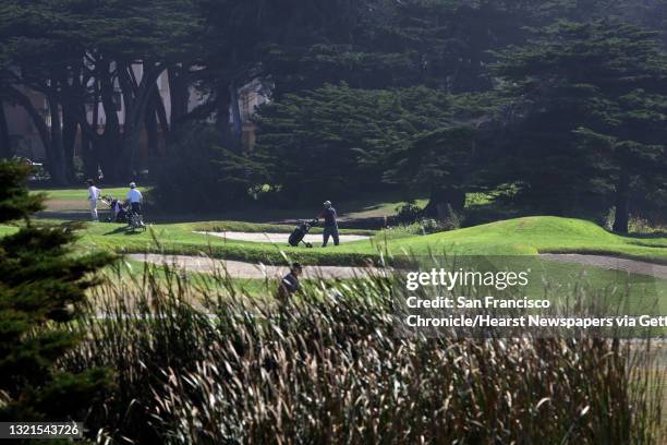 Golfers at Sharp Park Golf Course showing Salada Beach marsh in Pacifica Calif., on Monday, September 22, 2008. Environmentalists are upset over the...