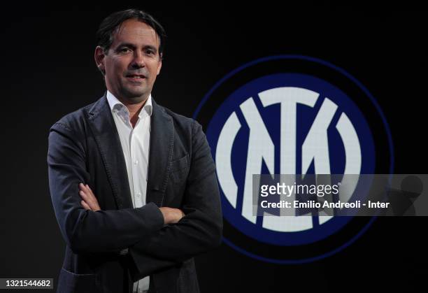 Internazionale head coach new signing Simone Inzaghi poses at the club's training ground Suning Training Center in memory of Angelo Moratti on June...