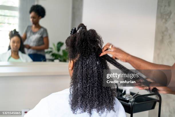 hair stylist in brazil. - african american hair salon stock pictures, royalty-free photos & images