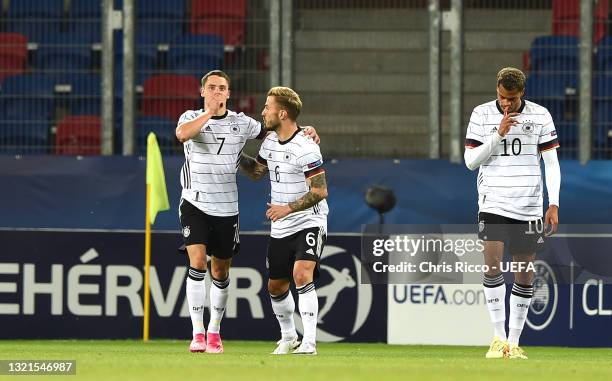 Florian Wirtz of Germany celebrates with Niklas Dorsch after scoring their side's second goal during the 2021 UEFA European Under-21 Championship...