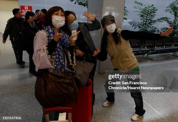 Outside of customs Naomi Fukayama , who's 5 months pregnant and arrived yesterday, picking up friends from Japan Eriko Mogi and Satomi Umezu as they...