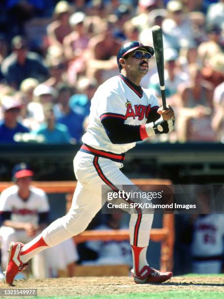 Reggie Jackson of the California Angels at bat during a game at Anaheim Stadium in Anaheim, California. Reggie Jackson played for 21 years with 4...