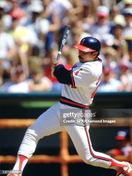 Reggie Jackson of the California Angels at bat during a game at Anaheim Stadium in Anaheim, California. Reggie Jackson played for 21 years with 4...