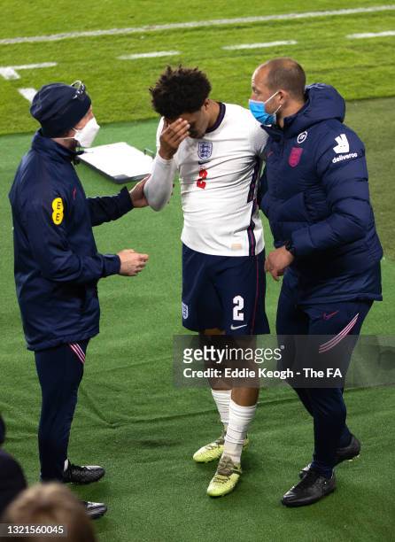 Trent Alexander-Arnold of England reacts after being substituted with a injury during the international friendly match between England and Austria at...