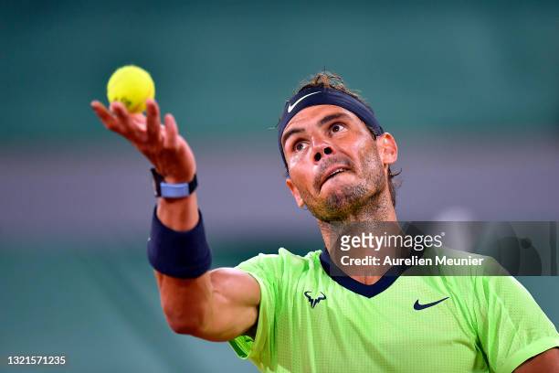 Rafael Nadal of Spain serves during his mens second round match against Richard Gasquet of France during day five of the 2021 French Open at Roland...