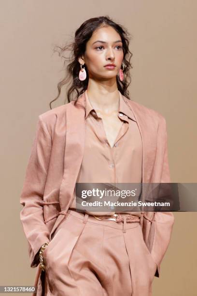 Model walks the runway during the Indigenous Fashion Projects show during Afterpay Australian Fashion Week 2021 Resort '22 Collections at...
