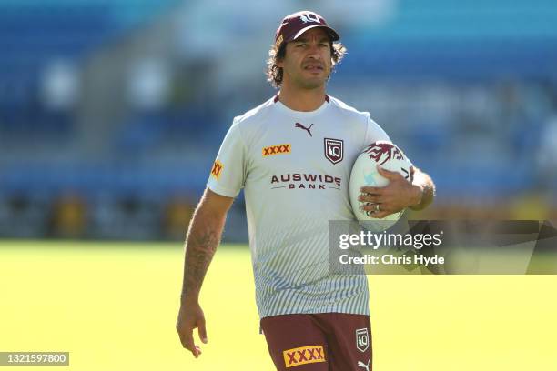 Assistant Coach Johnathan Thurston looks on during a Queensland Maroons State of Origin training session at Cbus Super Stadium on June 04, 2021 in...