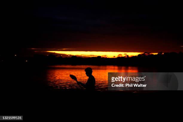 Athletes train on Lake Pupuke before the New Zealand Olympic Committee Women's Canoe Sprint announcement at North Shore Canoe Club on June 04, 2021...