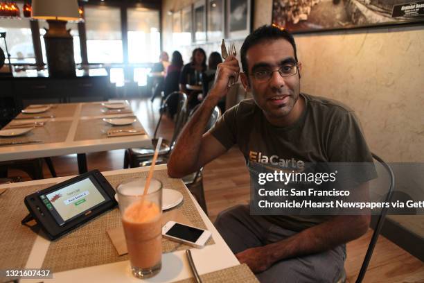 And founder Rajat Suri of E la Carte, a new tablet that restaurants can put at every table for do-it-yourself ordering and paying the bill, talking...