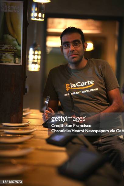 And founder Rajat Suri of E la Carte, a new tablet that restaurants can put at every table for do-it-yourself ordering and paying the bill, with his...