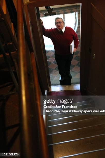 Music librarian Steve White stands by the door leading to the room where he runs the supertitles at the San Francisco Opera in San Francisco,...
