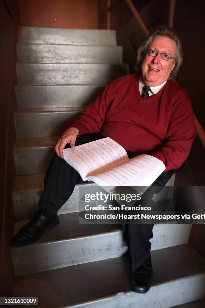 Music librarian Steve White sits on the stairs leading to the room where he runs the supertitles at the San Francisco Opera in San Francisco,...