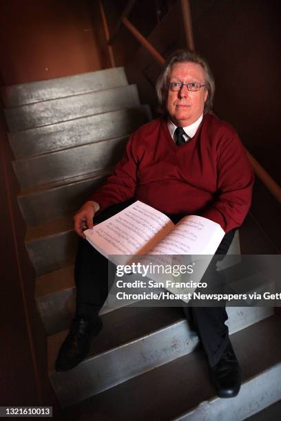 Music librarian Steve White sits on the stairs leading to the room where he runs the supertitles at the San Francisco Opera in San Francisco,...