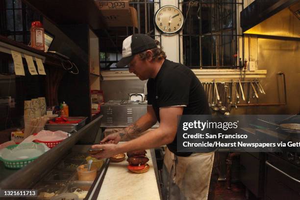 Co-owner and chef Shane LaValley prepping a crispy pork tenderloin sandwich at the Broken Record Kitchen in San Francisco, Calif., on Tuesday, August...