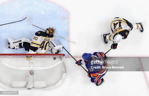 Mathew Barzal of the New York Islanders scores a third period goal against Tuukka Rask of the Boston Bruins in Game Three of the Second Round of the...