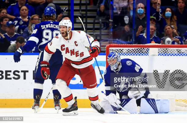 Jordan Staal of the Carolina Hurricanes celebrates an overtime power play goal during Game Three of the Second Round of the 2021 Stanley Cup Playoffs...