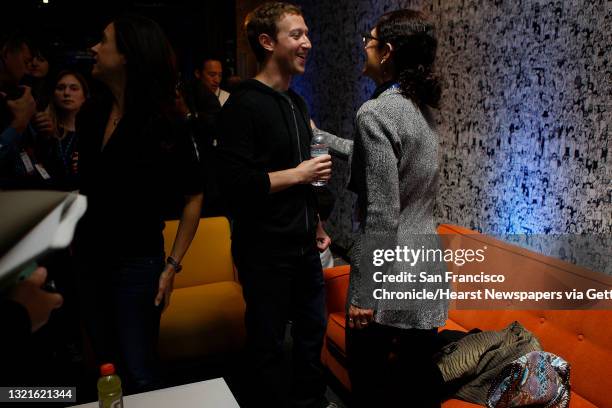 Chairman and chief executive Mark Zuckerberg talks with his mother Karen Zuckerberg after he introduced Facebook Home on Android at Facebook...