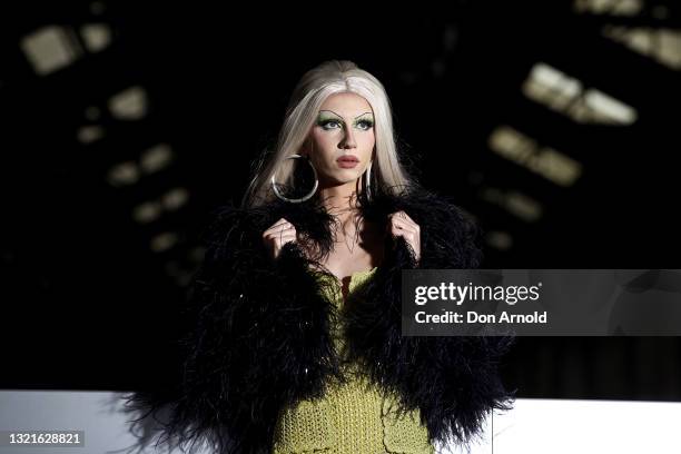 Tackie Onassis wearing Alice McCall Resort 22 ostrich feather jacket at Afterpay Australian Fashion Week 2021 on June 04, 2021 in Sydney, Australia.