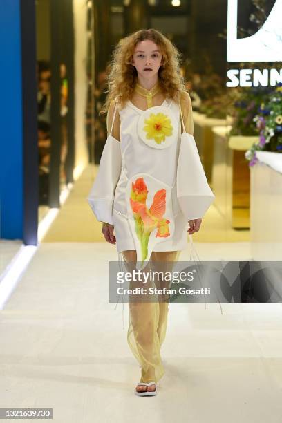 Model walks the runway during the Karla Spetic show during Afterpay Australian Fashion Week 2021 Resort '22 Collections at Sennheiser Sydney Store on...