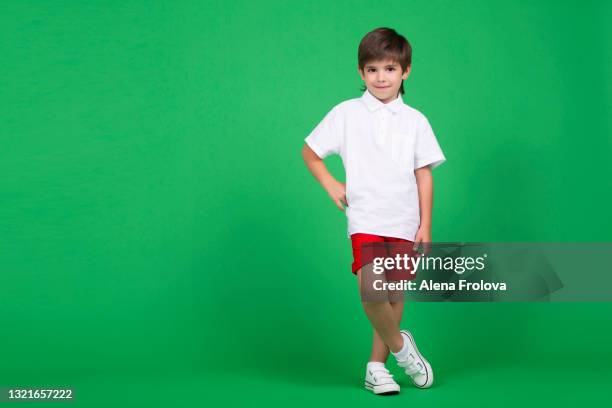 cute boy is staying, smiling and looking at camera, chroma key - chroma key stock pictures, royalty-free photos & images
