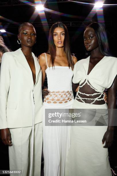 Models pose backstage ahead of the Christopher Esber show during Afterpay Australian Fashion Week 2021 Resort '22 Collections at Carriageworks on...