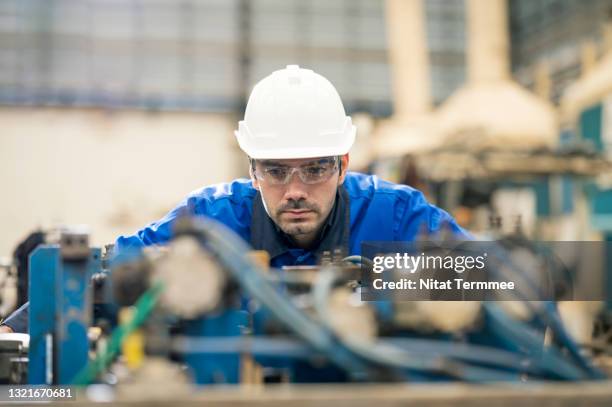 quality control engineer working at production line while checking and improve accuracy of jig checking fixture for auto part inspection in production process. quality control assurance in automobile industry. - auto cad stock pictures, royalty-free photos & images