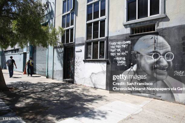 View of the building owned by Doug MacNeil of Spiral Binding, on Monday, August 1 in San Francisco, Calif. The building is about a third of the block.