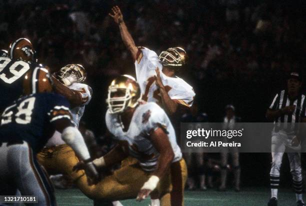 Quarterback Chuck Fusina of the Baltimore Stars passes a ball in the Championship Game of the United States Football League between the Baltimore...