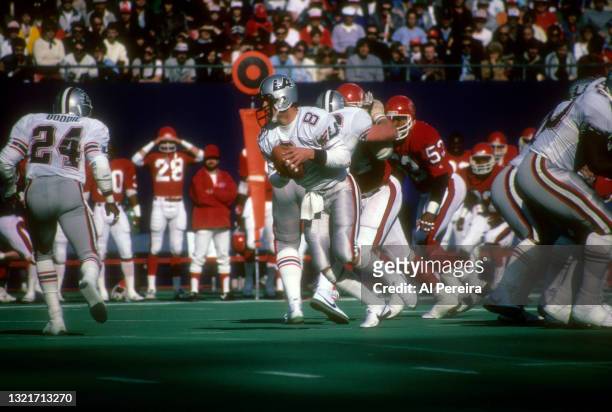 Quarterback Steve Young of the Los Angeles Express turns to hand off in the game between the Los Angeles Express vs The New Jersey Generals of the...