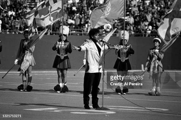 Melba Moore performs the National Anthem before the game between the Los Angeles Express vs The New Jersey Generals of the United States Football...