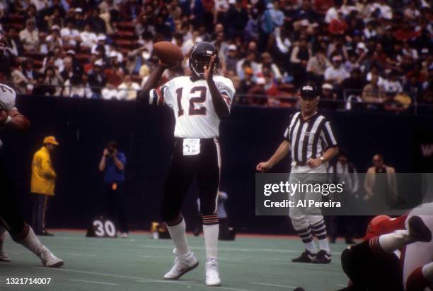 Quarterback Doug Williams of the Oklahoma Outlaws passes the ball in the game between the Oklahoma Outlaws vs The New Jersey Generals of the United...