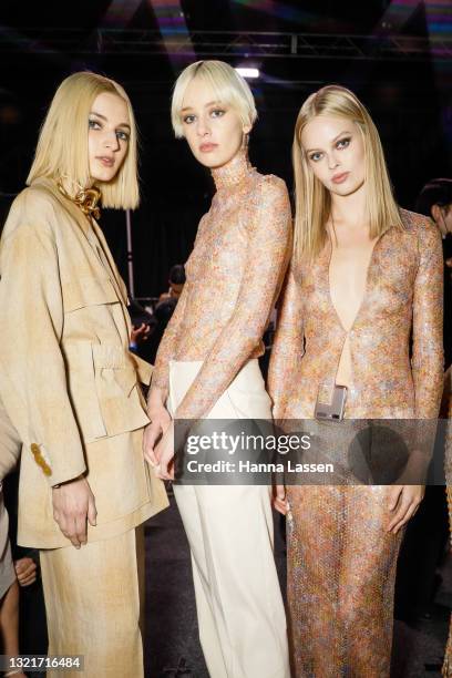 Model prepares backstage ahead of the Christopher Esber show during Afterpay Australian Fashion Week 2021 Resort '22 Collections at Carriageworks on...