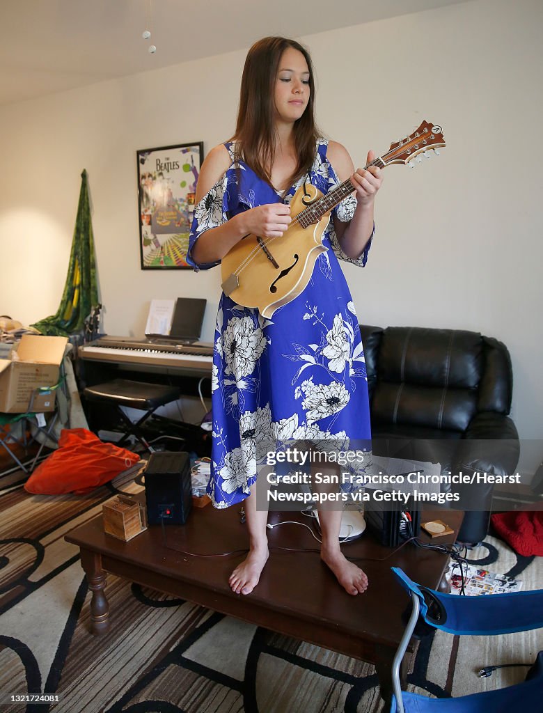 AJ Lee, 19 year old singer, mandolinist, fiddler and guitarist from... News  Photo - Getty Images