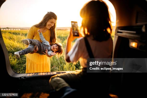 we are happy family - pregnant woman car stock pictures, royalty-free photos & images