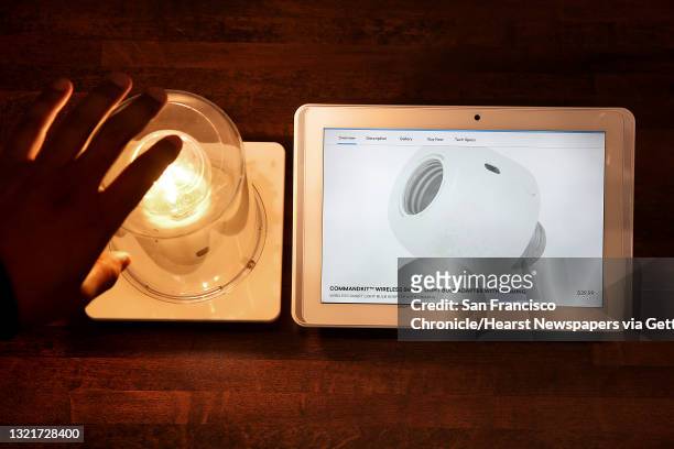 Commandk/t wireless smart light bulb adapter displayed at Lowe?s SmartSpot location run by b8ta on Wednesday, November 22 in Antioch, Calif.