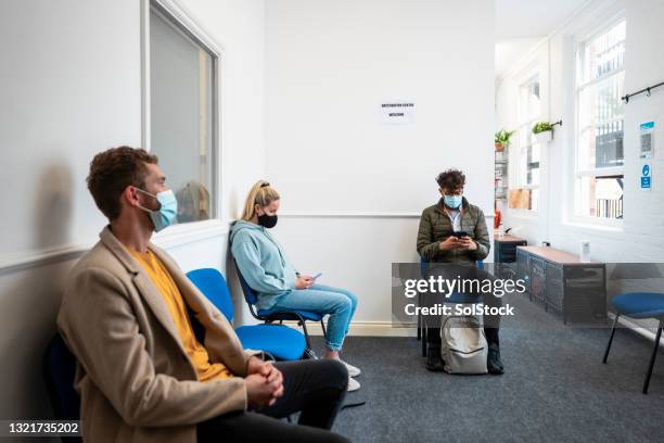 ready for their vaccination - social distancing stock pictures, royalty-free photos & images
