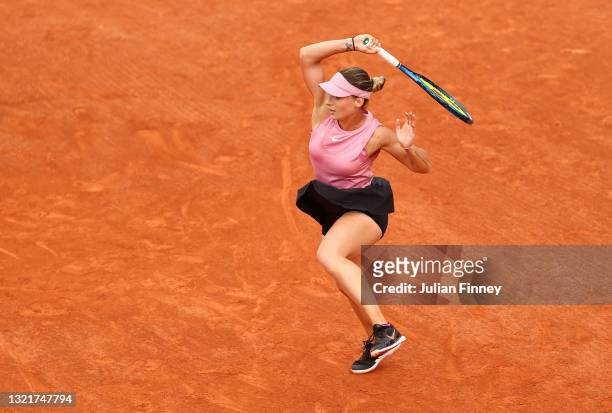 Ana Bogdan of Romania plays a backhand during her Women's Singles third round match against Paula Badosa of Spain on day six of the 2021 French Open...