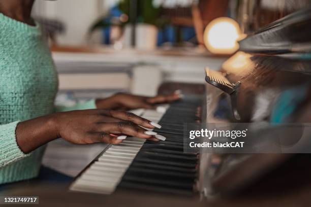 517 Black Hands Piano Stock Photos, High-Res Pictures, and Images
