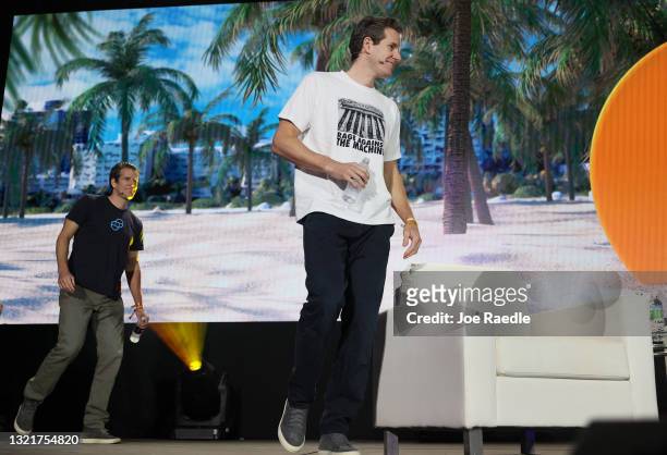 Tyler Winklevoss and Cameron Winklevoss creators of crypto exchange Gemini Trust Co. Arrive on stage at the Bitcoin 2021 Convention, a...