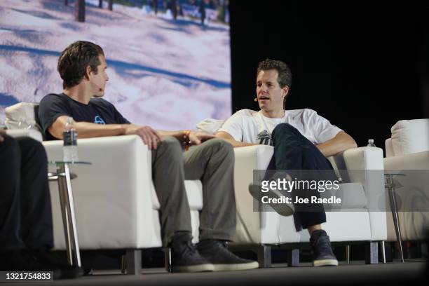 Tyler Winklevoss and Cameron Winklevoss creators of crypto exchange Gemini Trust Co. On stage at the Bitcoin 2021 Convention, a crypto-currency...