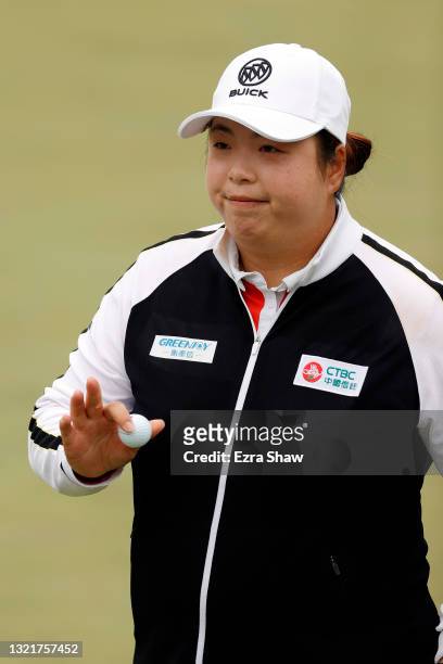 Shanshan Feng of China reacts to a putt on the 18th hole during the second round of the 76th U.S. Women's Open Championship at The Olympic Club on...