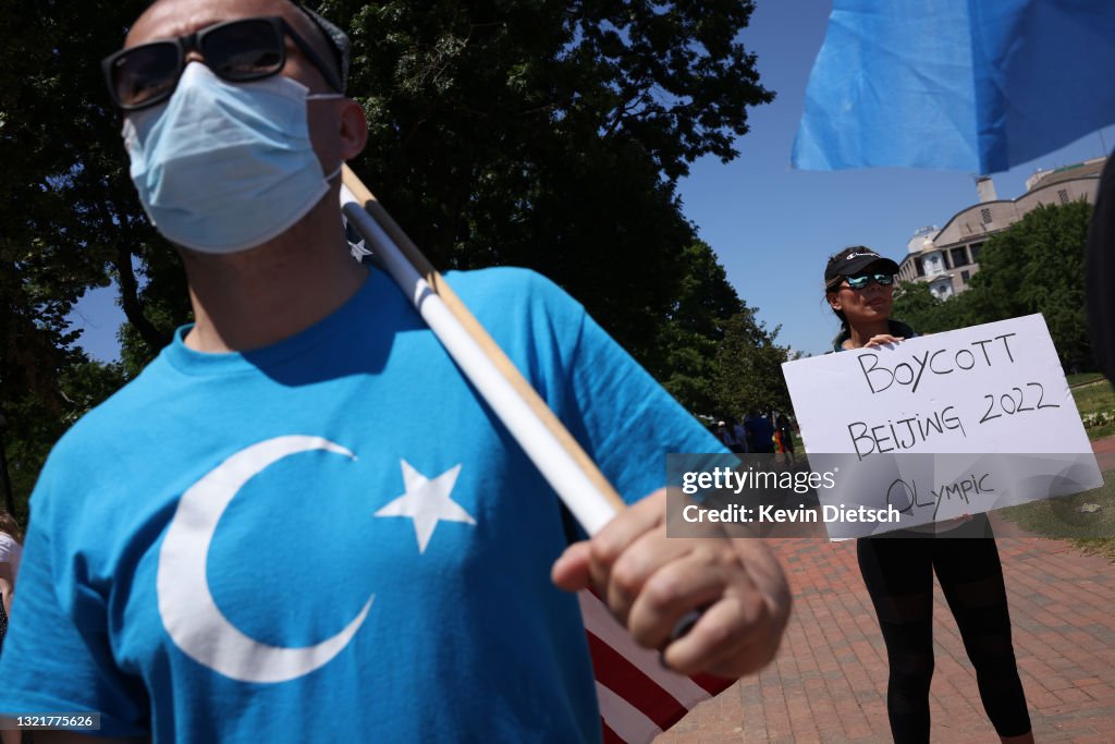 Protesters March In Washington, DC Demanding Action Against China's Treatment Of Minority Groups