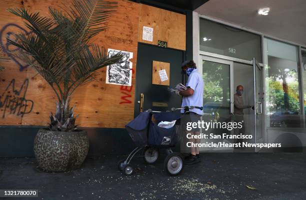 Mail is delivered to Bon Voyage restaurant and bar which has been closed since March and seen on Thursday, July 16 in San Francisco, Calif.