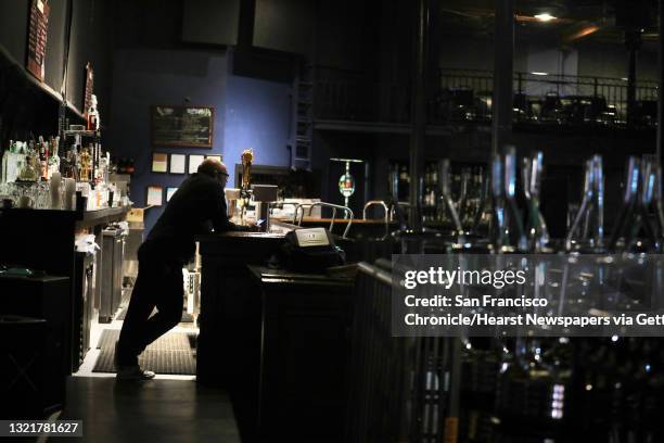 General manager Kent Jamieson stands at the bar at Slim's nightclub in San Francisco's South of Market neighborhood which is on the verge of closing...