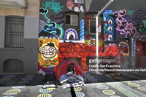 Homeless man eats a lunch from MealsinPlaceSF on Fern St. In the Tenderloin on Tuesday, April 28 in San Francisco, Calif. In partnership with the San...