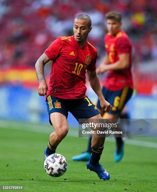 Thiago Alcantara of Spain runs with the ball during the international friendly match between Spain and Portugal at Wanda Metropolitano stadium on...