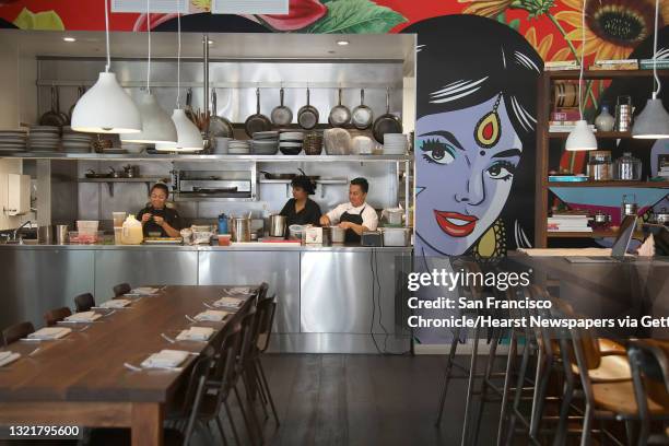 Viewof the kitchen from part of the dining room of Besharam, a new Gujarati restaurant seen on Thursday, Aug. 16, 2018 in San Francisco, Calif.