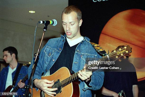 Scottish musician, record producer, and bassist Guy Berryman and English singer, songwriter, multi-instrumentalist, record producer, and...