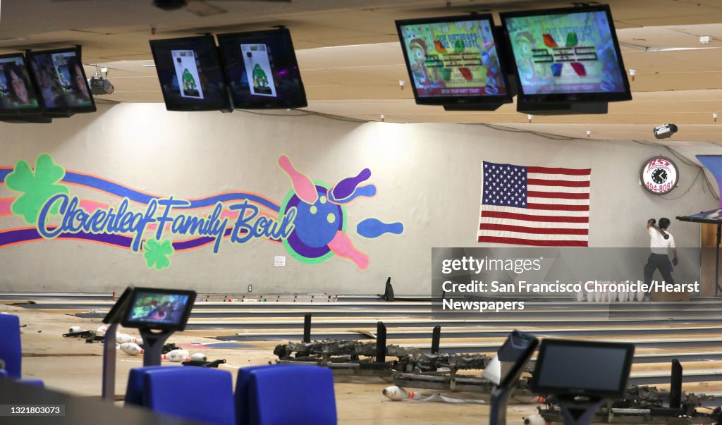 View of Cloverleaf Family Bowl as head mechanic Antonio Ledezma (right) moves rollers for parts at Classic Bowling Center in Daly City seen on Thursday, Aug. 27, 2020, in Fremont, Calif. Cloverleaf Family Bowl, a fixture in Fremont since the 1950s and cl