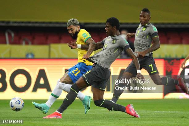 Gabriel Barbosa of Brazil fights for the ball with Robert Arboleda of Ecuador during a match between Brazil and Ecuador as part of South American...